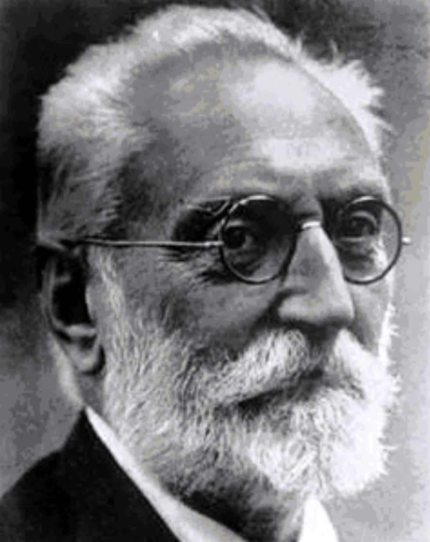 photo ancienne d'un homme avec barbe blanche et lunettes, ressemblant fort étrangement à Henri Béhar